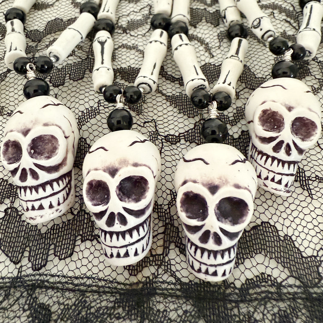 Skull and Bones Rattle Necklace