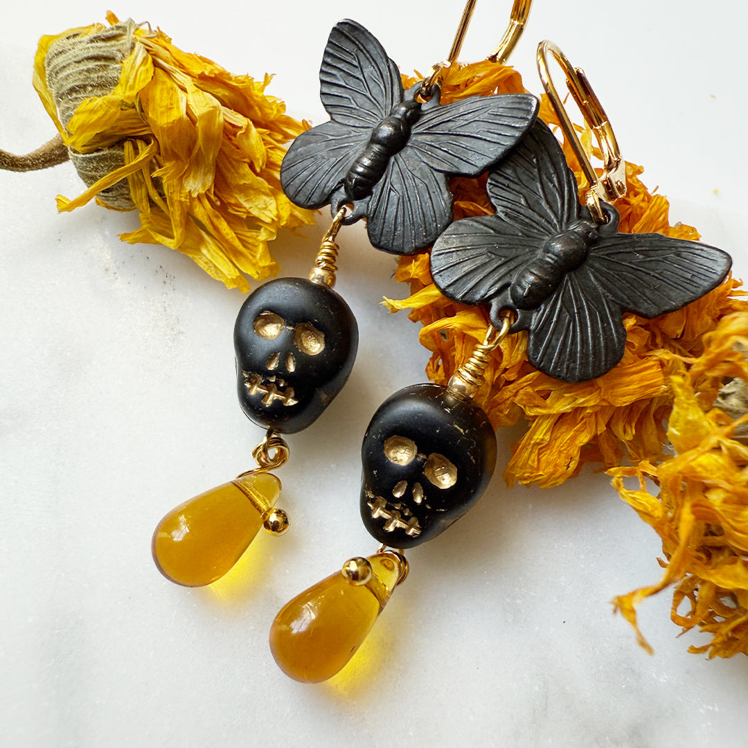 Amber Flight Memento Skull Earrings